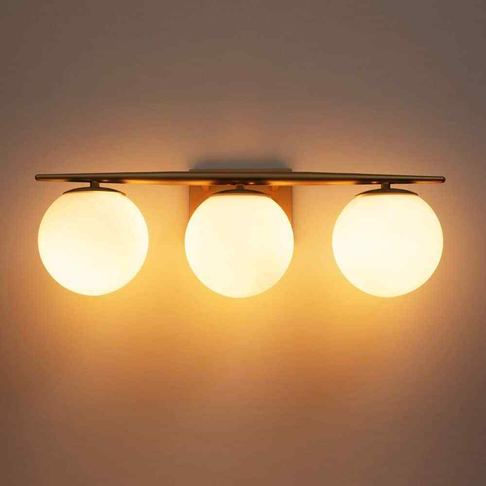 RRTYO Kara 21.97 in. 3-Light Gold Vanity Light with Milky White Glass Ball Shade