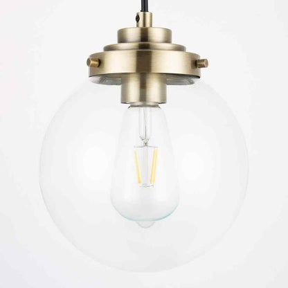 Merra 1-Light Brass Spherical Pendant Light with Globe Glass Shade