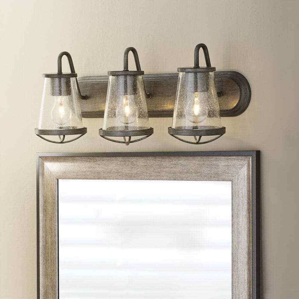 Home Decorators Georgina 24 in. 3-light Weathered Iron Industrial Indoor Vanity