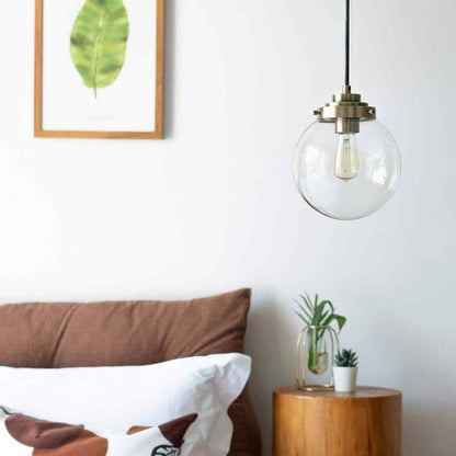 Merra 1-Light Brass Spherical Pendant Light with Globe Glass Shade
